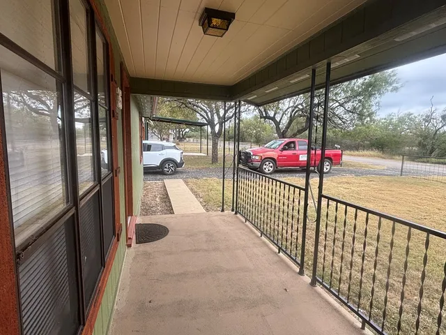 a view of a house with a porch