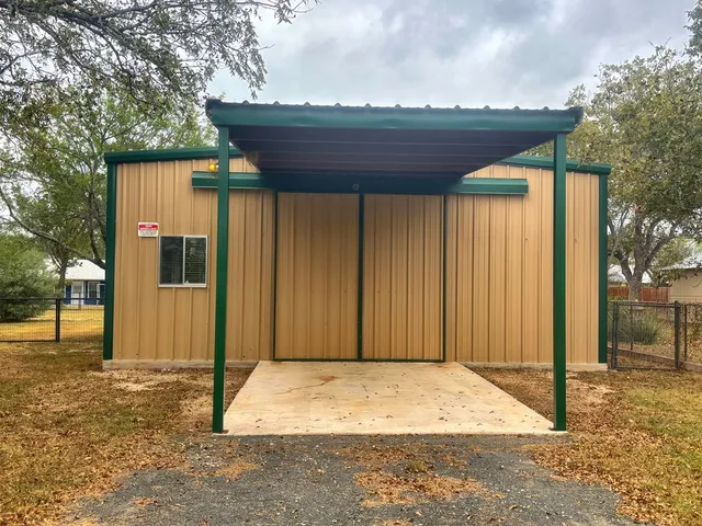 a view of a backyard of the house