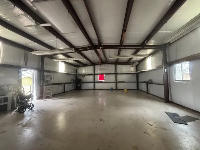 a kitchen with a stove and cabinets