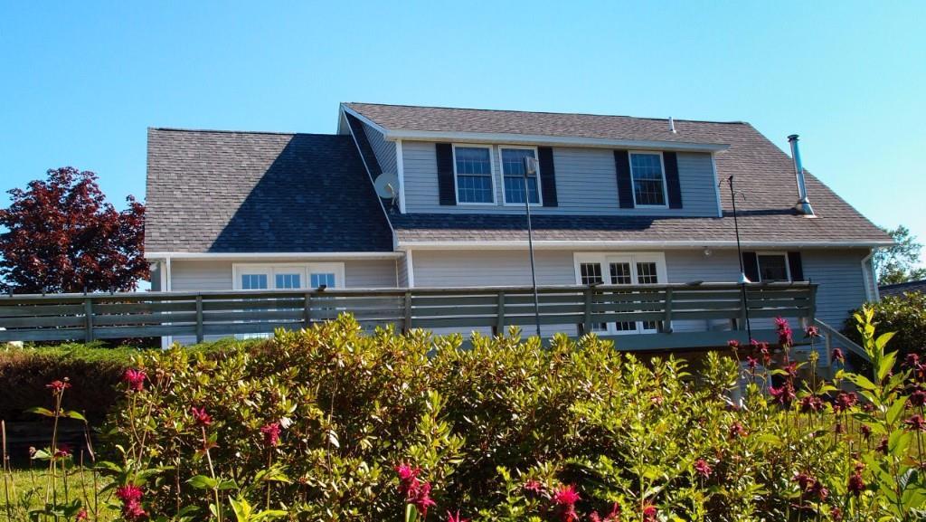 174 Kelleytown Road Tremont, ME 04612 - Photo 3 of 10 Exterior back of home. Deck nearly...