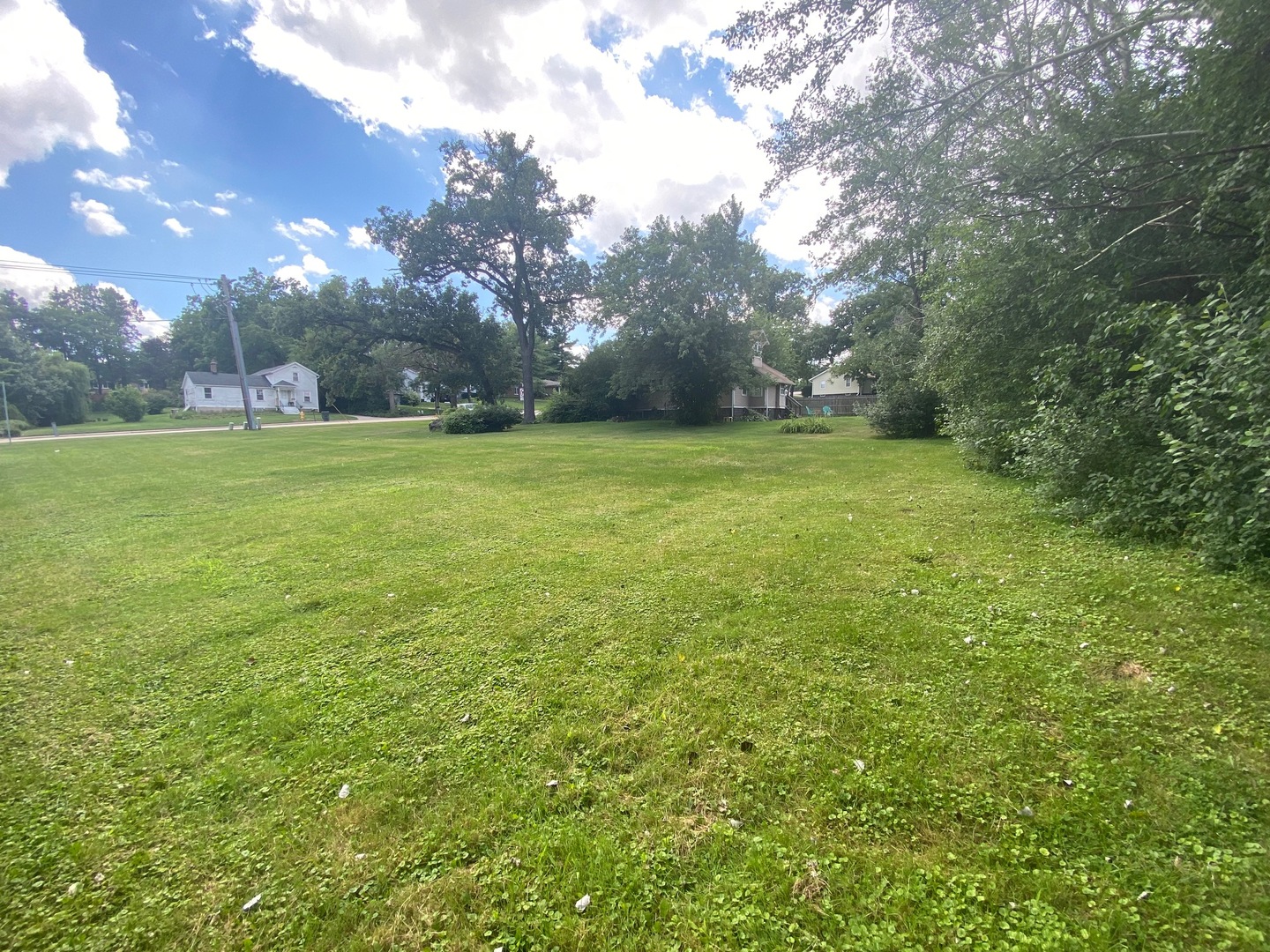 624 St Charles Road Glen Ellyn, IL 60137 - Photo 5 of 5 a view of a field of grass and trees