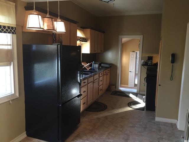 2705 Water Valley Road Santa Fe, TN 38482 - Photo 19 of 27 a kitchen with refrigerator and window