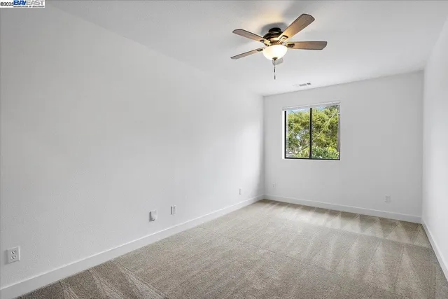 an empty room that has a window