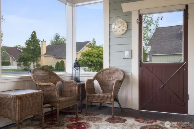 a view of a two chairs in a room