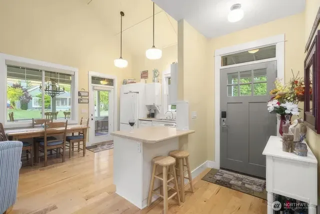 a view of a kitchen from a dining room
