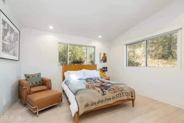 a kitchen with granite countertop a sink and cabinets