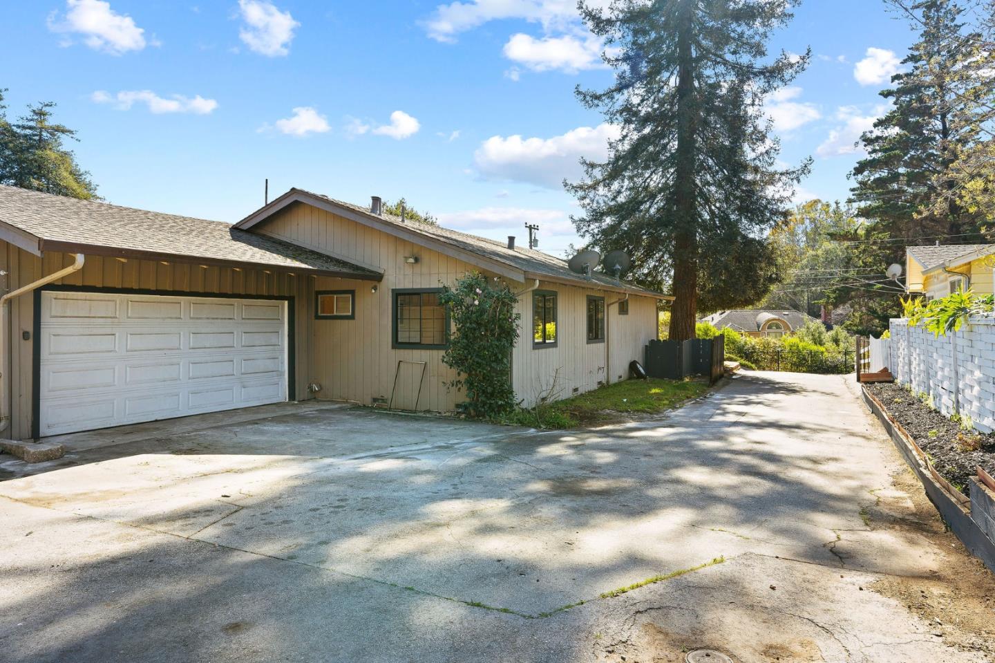 276 Hames Road Watsonville, CA 95076 - Photo 34 of 43 a view of a house with a yard and garage