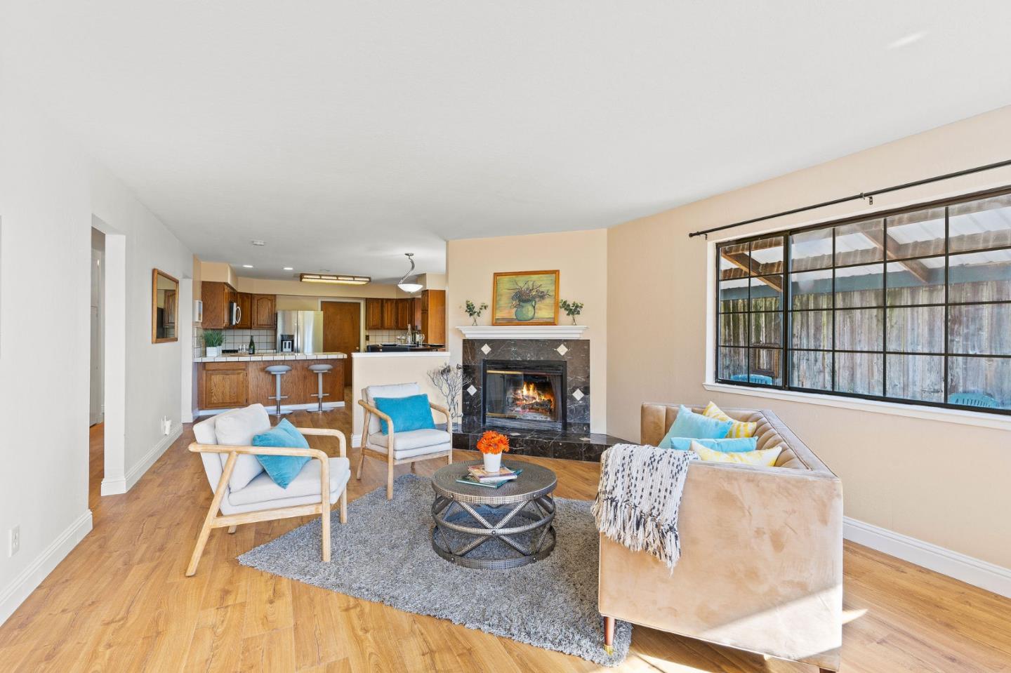 276 Hames Road Watsonville, CA 95076 - Photo 10 of 43 a living room with furniture and a floor to ceiling window
