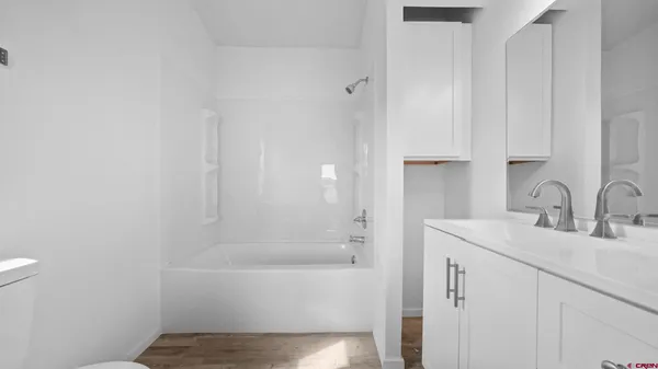a bathroom with a sink and a bathtub