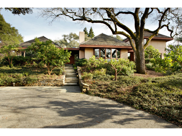140 Farm Road Woodside, CA 94062 - Photo 15 of 16 a front view of a house with garden