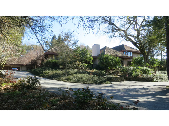 140 Farm Road Woodside, CA 94062 - Photo 2 of 16 a black and white photo of a house