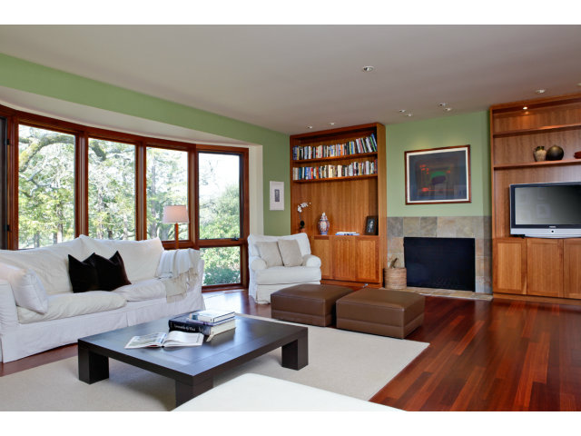 140 Farm Road Woodside, CA 94062 - Photo 8 of 16 a living room with furniture fireplace and flat screen tv