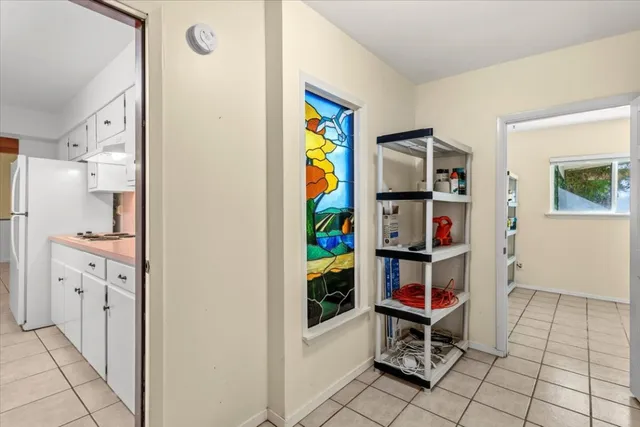 a room with painting and a table