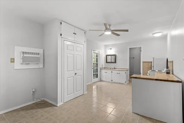 a view of a kitchen with electric appliances
