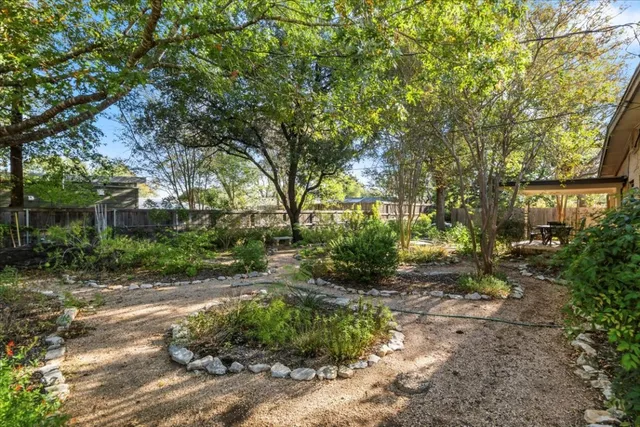 a view of backyard with green space