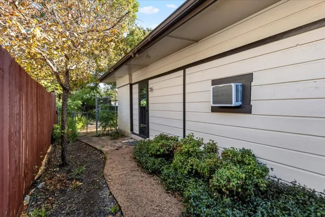 a backyard of a house with lots of green space