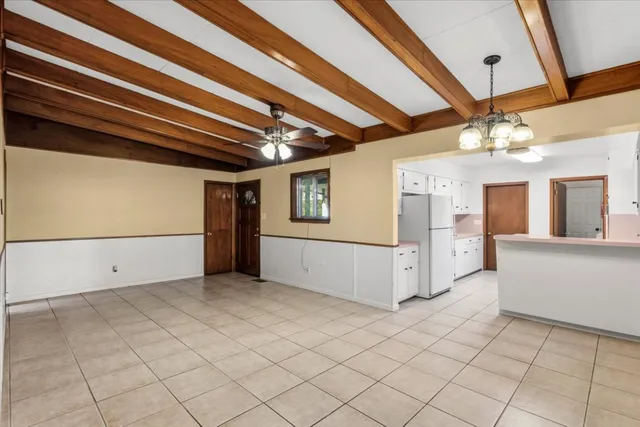 a view of a hallway with closet