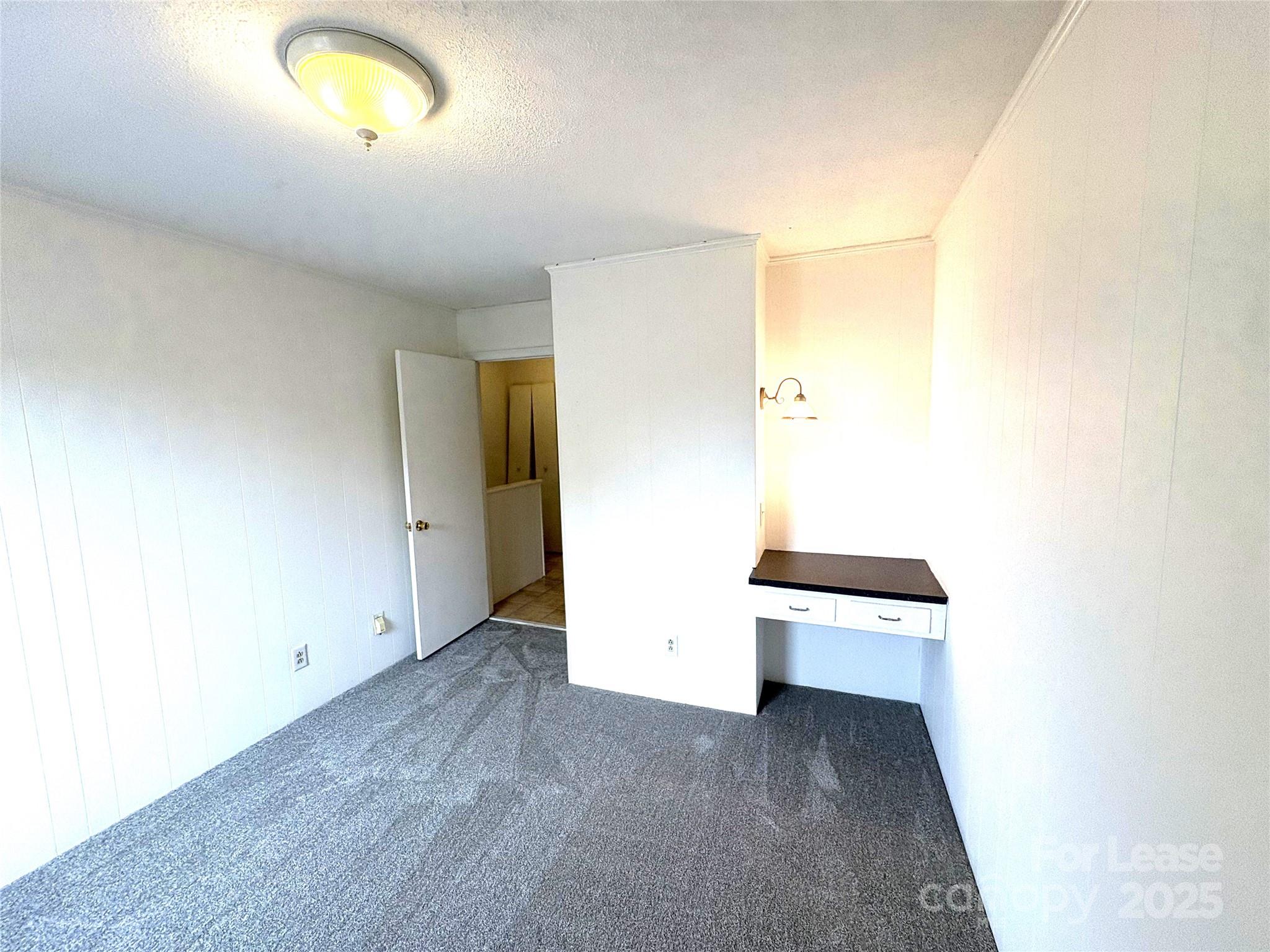 108 Durham Road Stanley, NC 28164 - Photo 19 of 20 a view of an empty room with a window