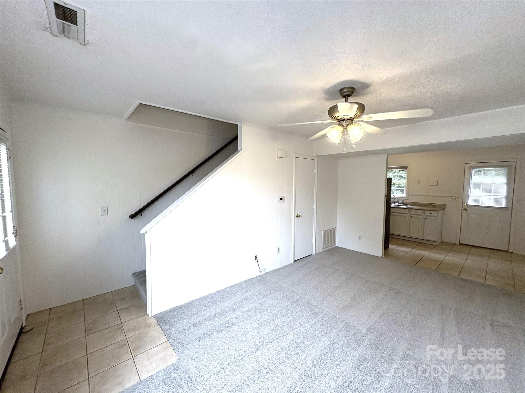 108 Durham Road Stanley, NC 28164 - Photo 3 of 20 a view of an empty room with a window
