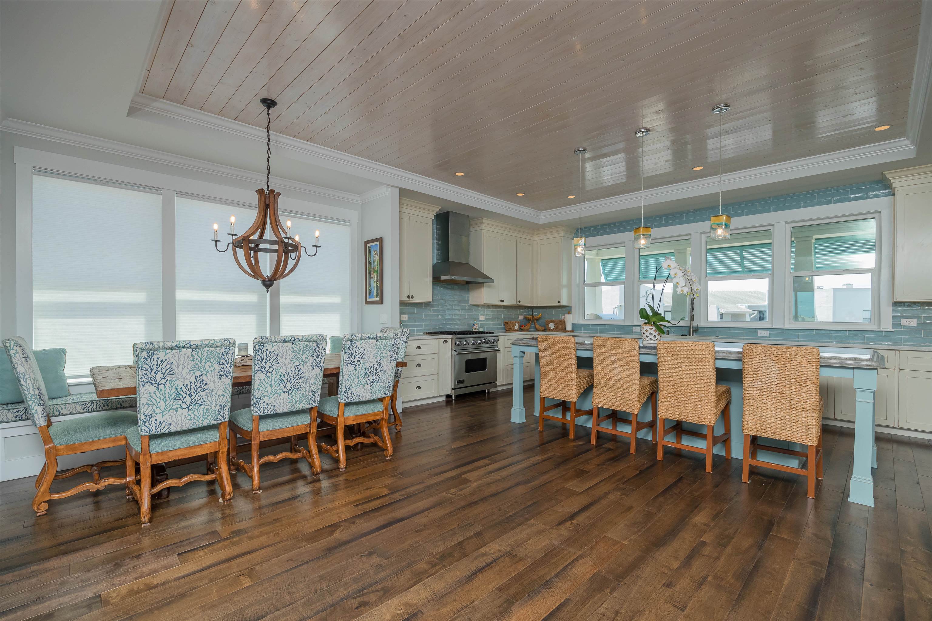 10 5th Street St. Augustine Beach, FL 32080 - Photo 17 of 49 a view of a dining room with furniture and wooden floor