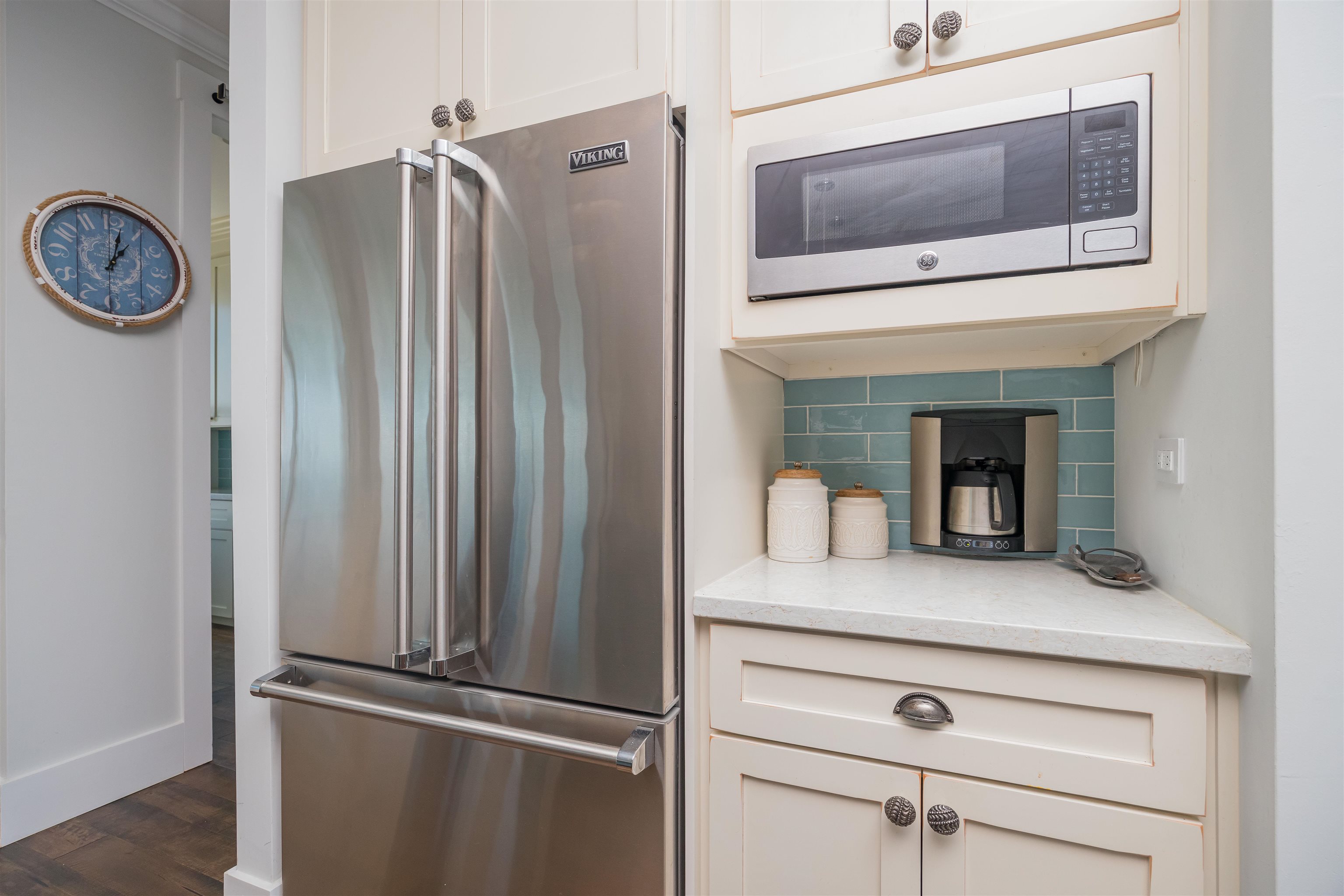 10 5th Street St. Augustine Beach, FL 32080 - Photo 22 of 49 a bathroom with a granite countertop sink and a mirror