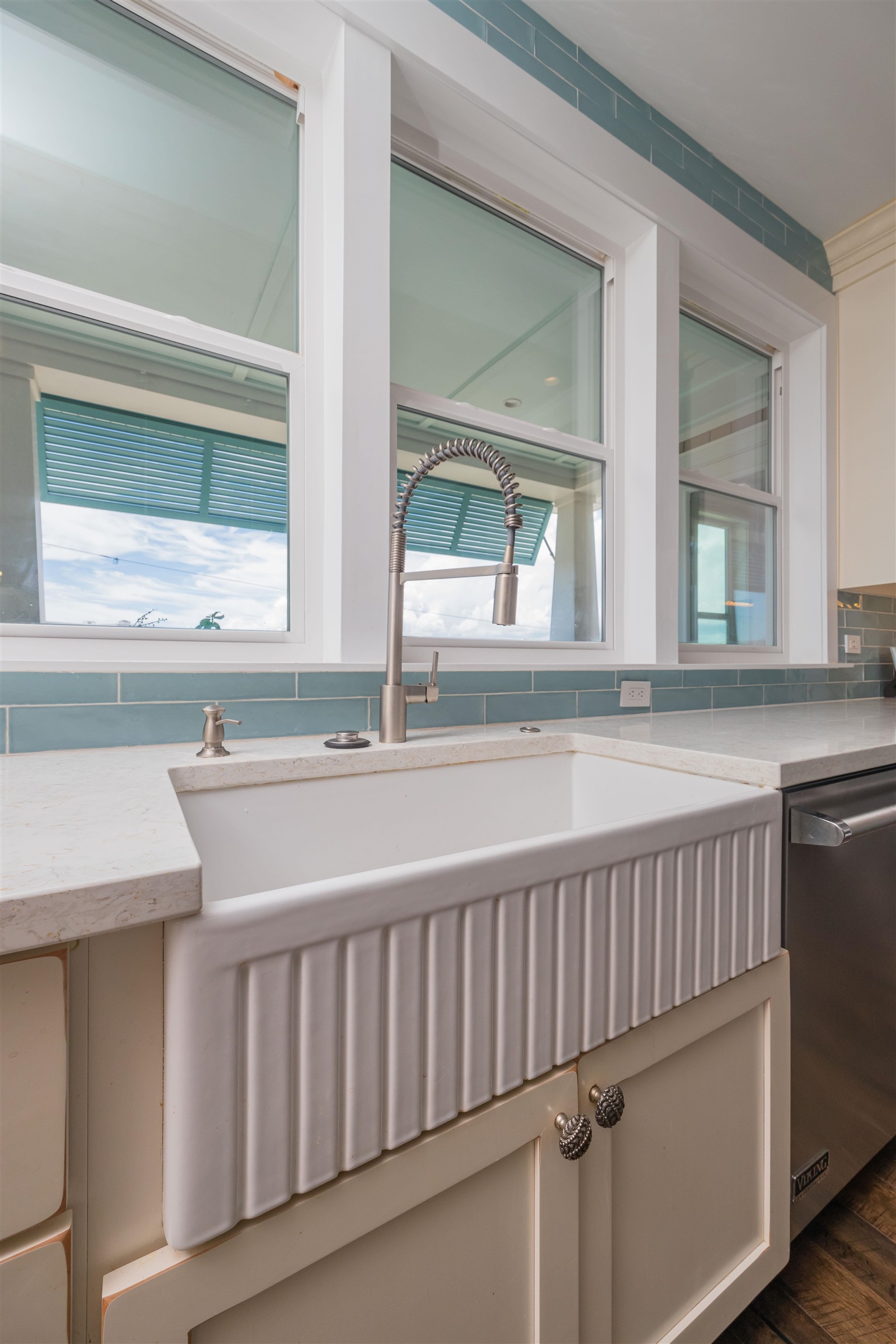 10 5th Street St. Augustine Beach, FL 32080 - Photo 23 of 49 a bathroom with a sink and a large mirror