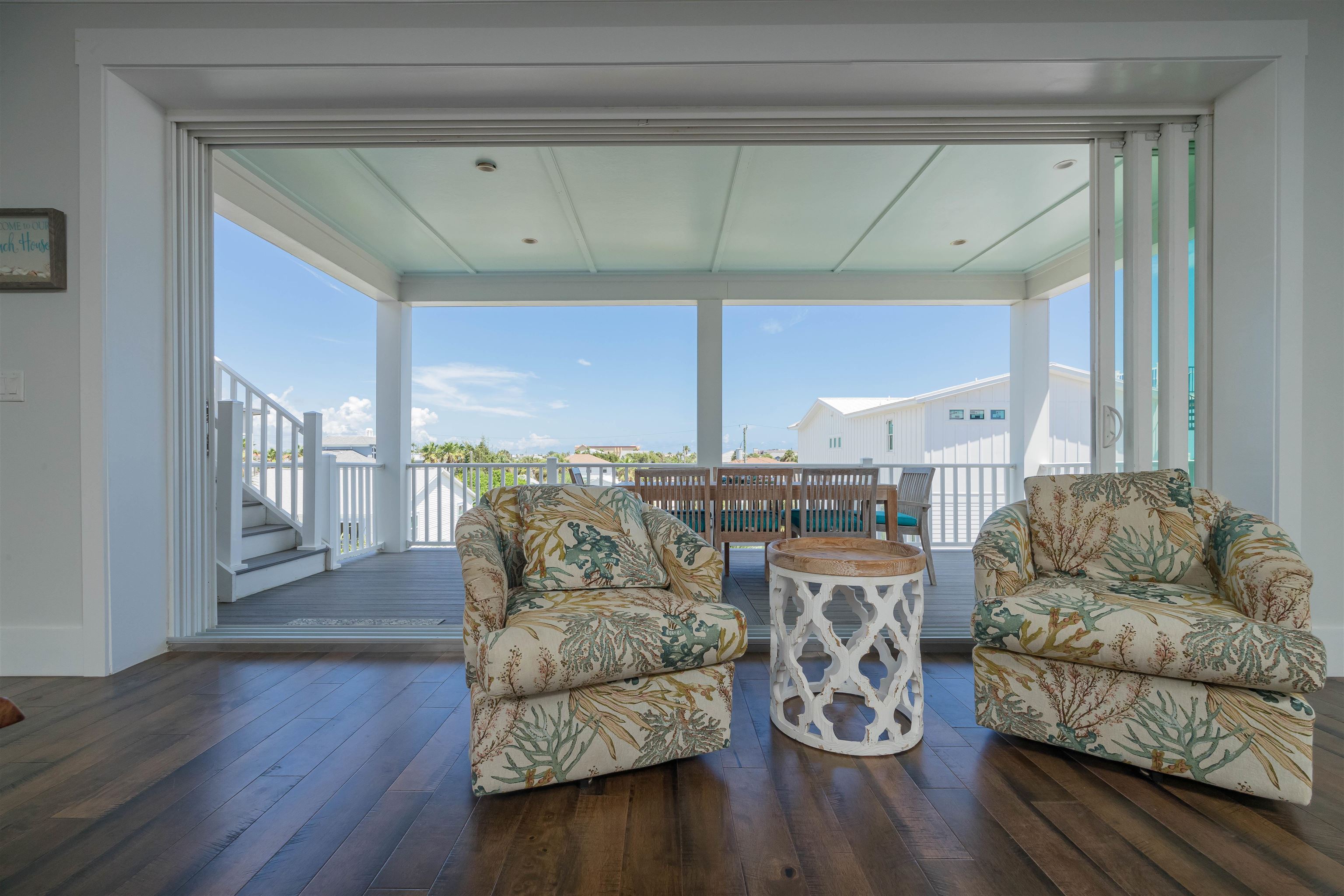 10 5th Street St. Augustine Beach, FL 32080 - Photo 29 of 49 a living room with furniture and wooden floor