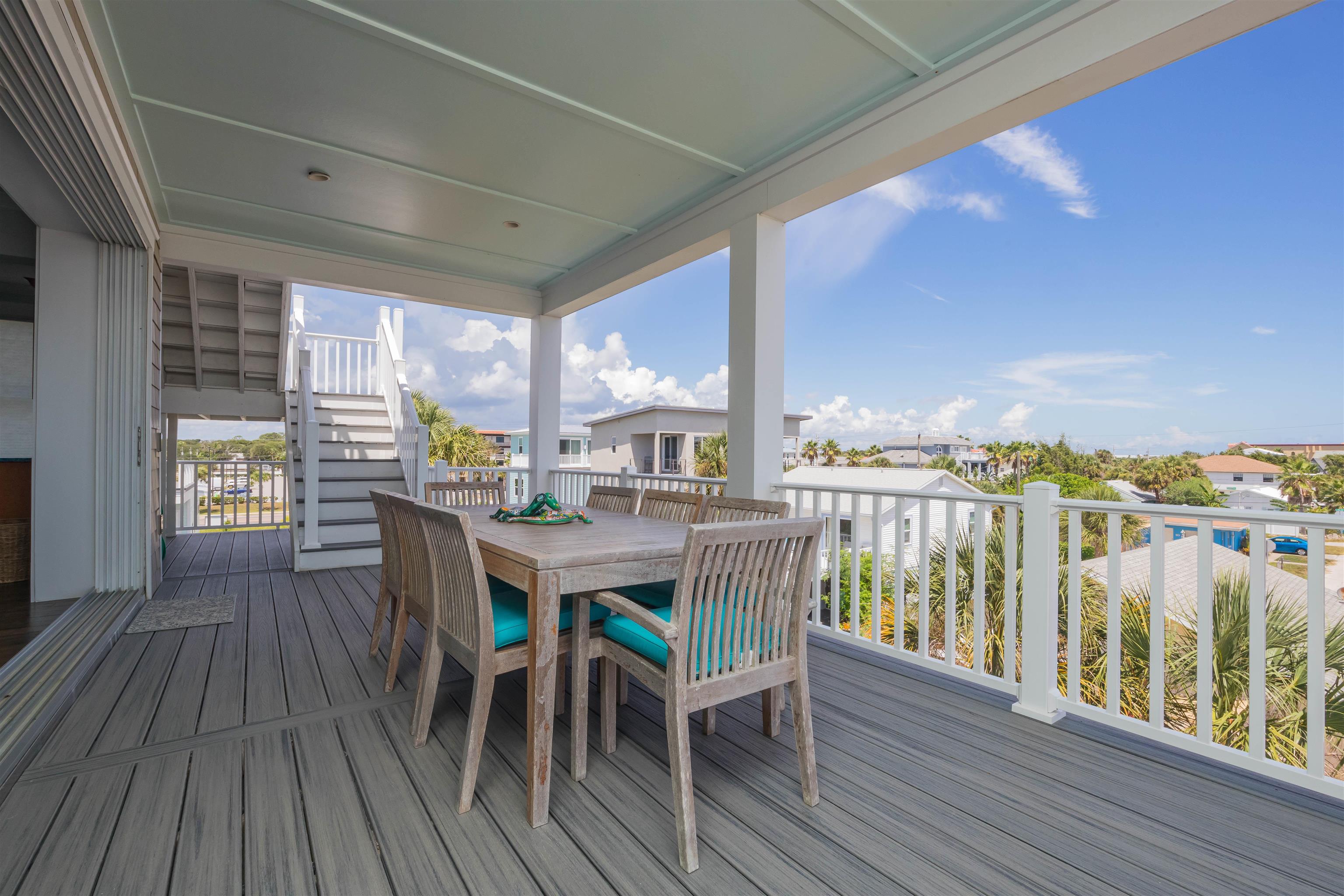 10 5th Street St. Augustine Beach, FL 32080 - Photo 30 of 49 a dining room with furniture wooden floor and garden view