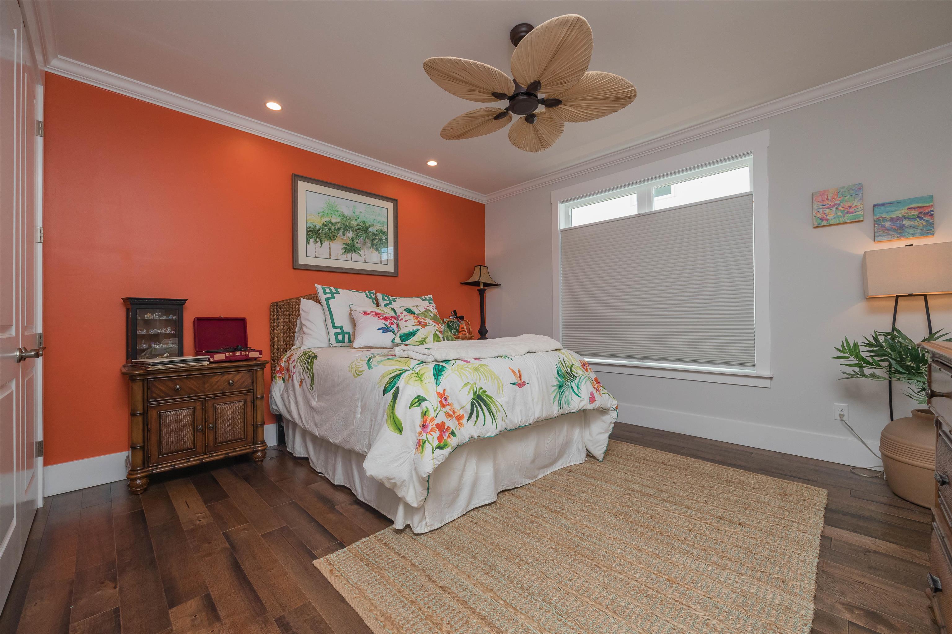 10 5th Street St. Augustine Beach, FL 32080 - Photo 35 of 49 a bedroom with a bed and wooden floor