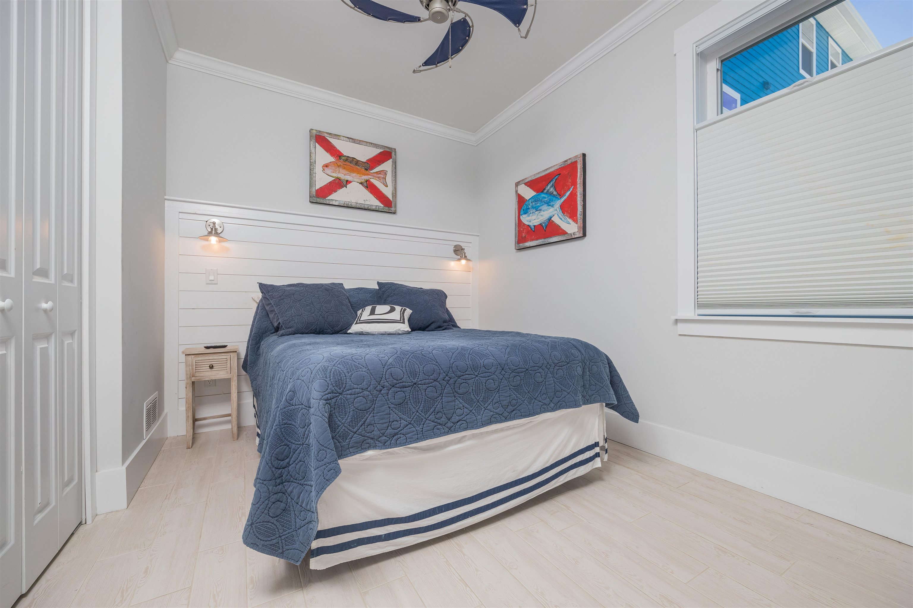 10 5th Street St. Augustine Beach, FL 32080 - Photo 41 of 49 a bedroom with a bed and a cabinets