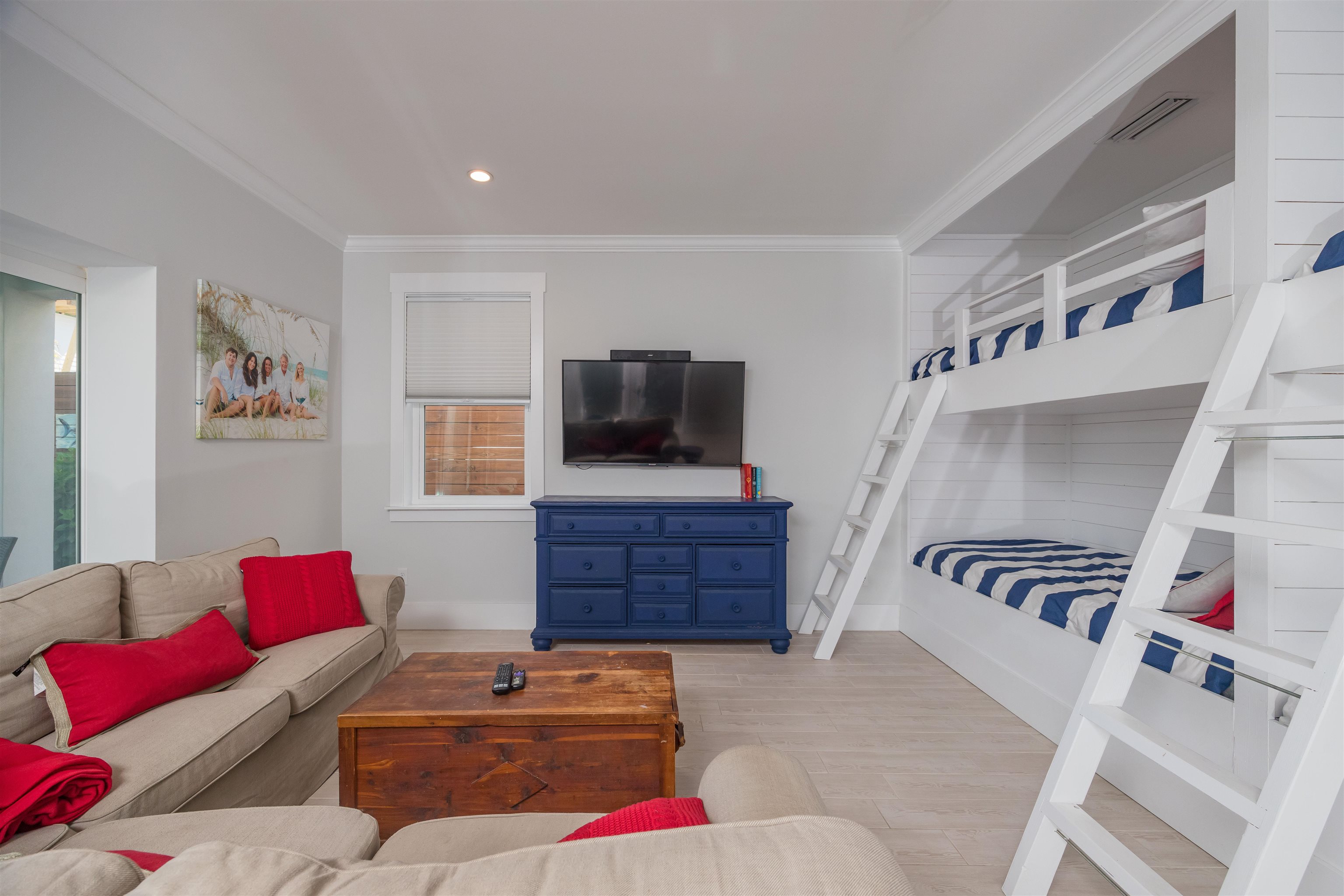 10 5th Street St. Augustine Beach, FL 32080 - Photo 46 of 49 a living room with furniture and a flat screen tv