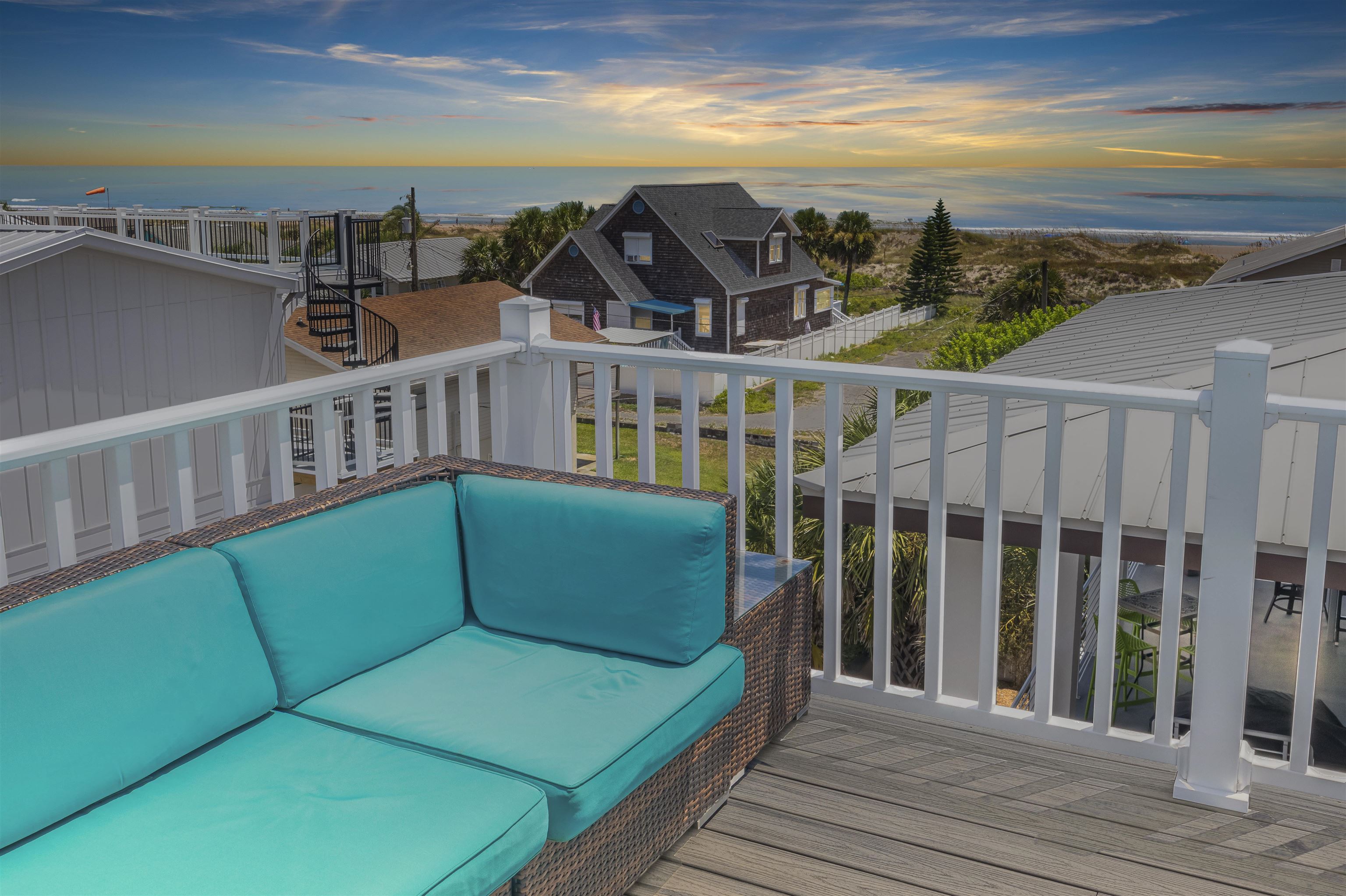 10 5th Street St. Augustine Beach, FL 32080 - Photo 7 of 49 a view of a balcony with an outdoor seating