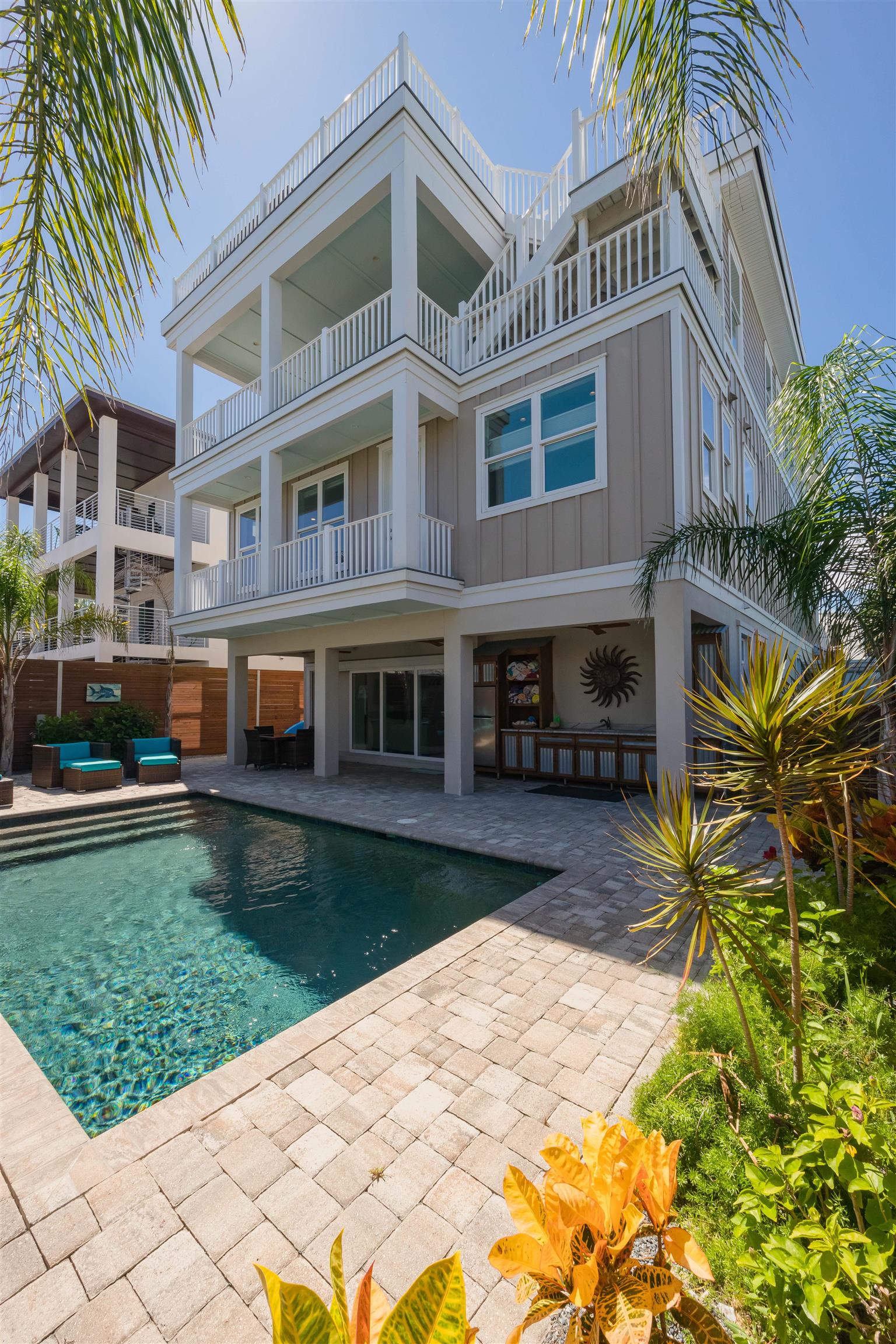 10 5th Street St. Augustine Beach, FL 32080 - Photo 10 of 49 a front view of a house with garden