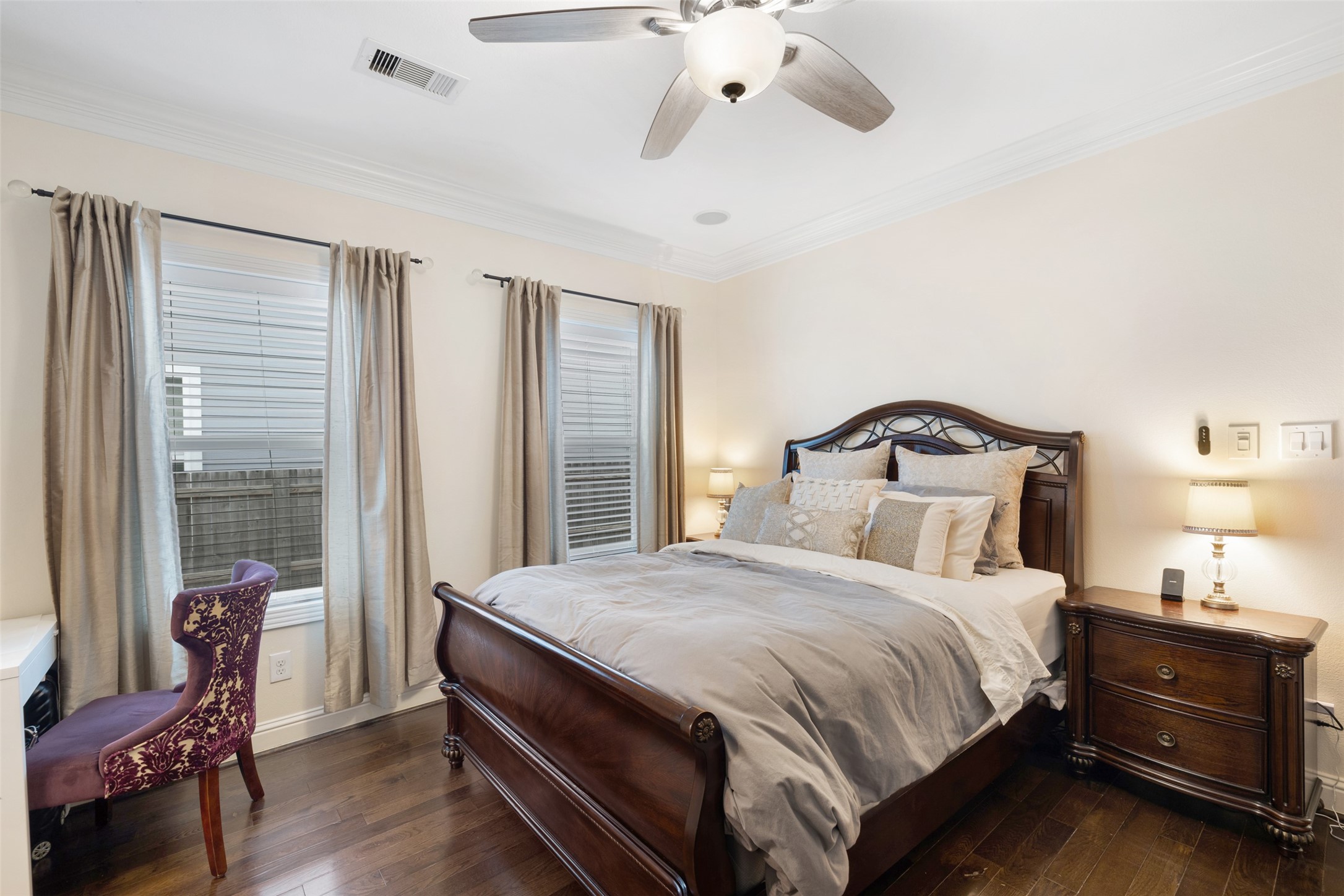 608 Jewett Street Houston, TX 77009 - Photo 15 of 23 a bedroom with a bed and wooden floor