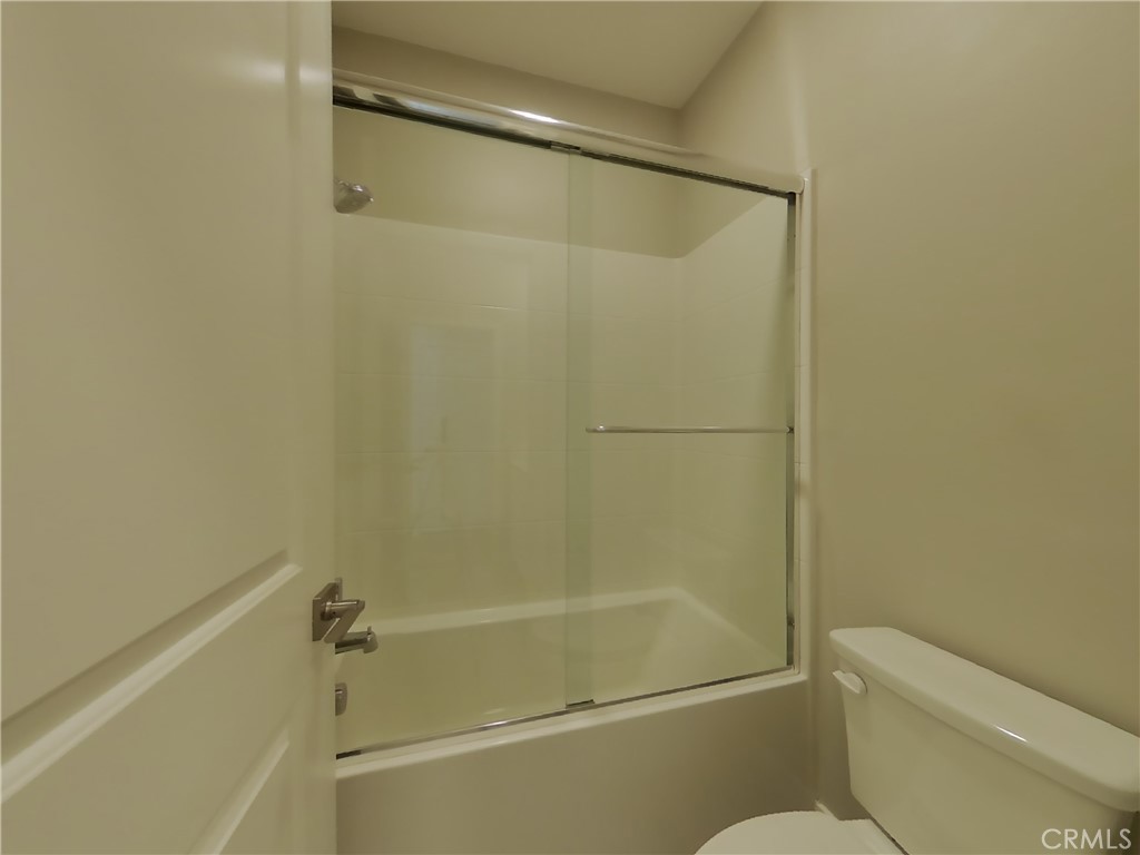 36591 Pepino Court Wildomar, CA 92595 - Photo 12 of 29 a bathroom with a shower and a toilet