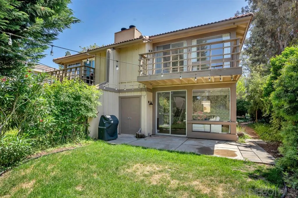 3047 Via De Caballo Encinitas, CA 92024 - Photo 12 of 25 front view of a brick house with a yard