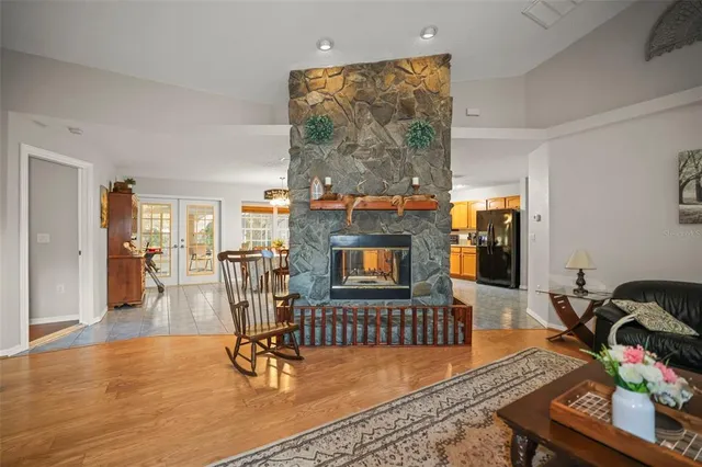 a view of livingroom with furniture and workspace