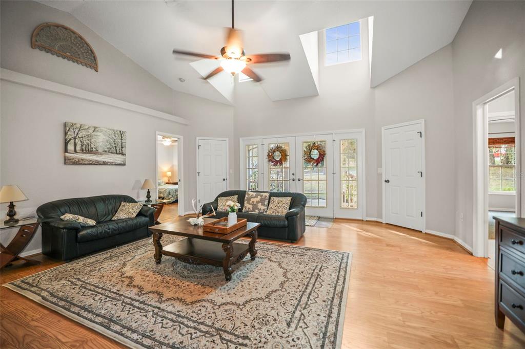 8412 Christopher Lane Weeki Wachee, FL 34613 - Photo 31 of 43 a living room with furniture and a rug