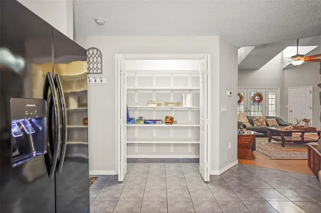 an aerial view of residential building with parking space