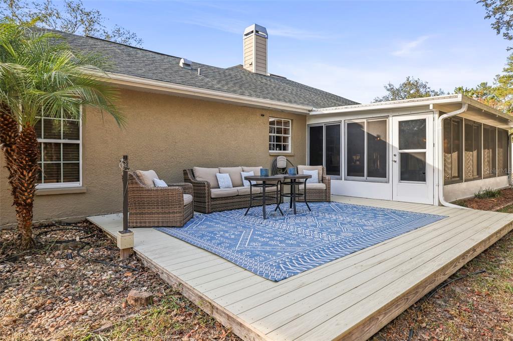 8412 Christopher Lane Weeki Wachee, FL 34613 - Photo 7 of 43 a front view of a house with garden