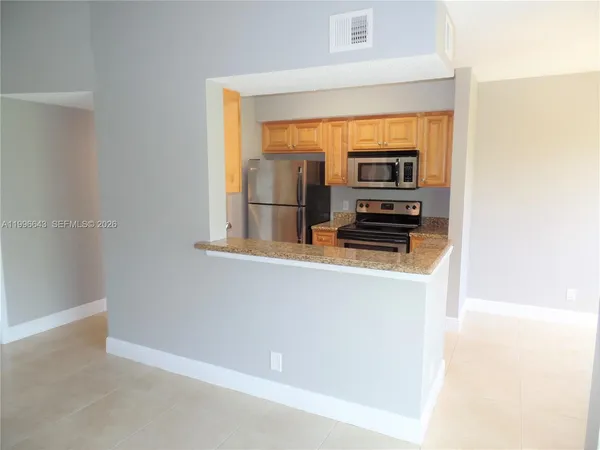 $1,895 | 5740 Rock Island Road, Unit 299, Tamarac, FL 33319