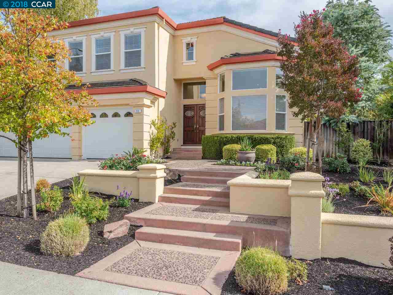 213 Dandelion Lane San Ramon, CA 94582 - Photo 1 of 1 a front view of a house with a yard and potted plants