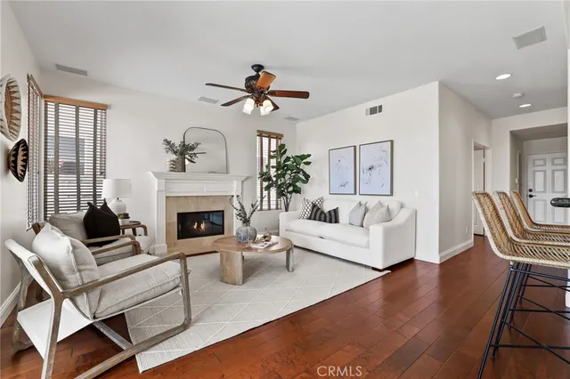 a view of kitchen with furniture and wooden floor