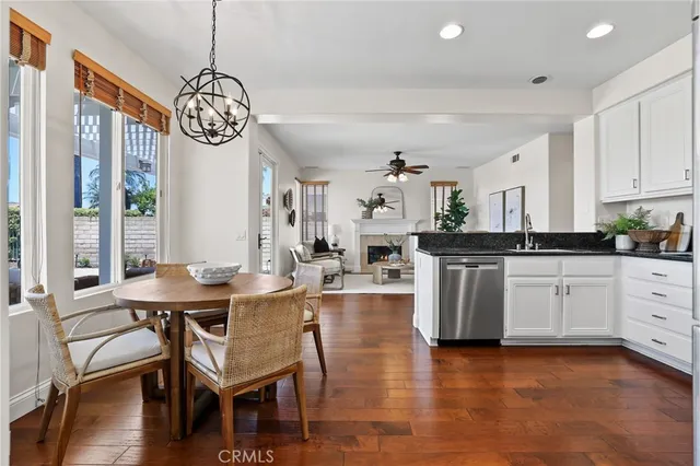 a view of entryway with wooden floor and stairs