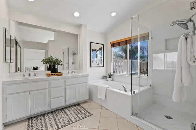 a view of a patio with a table and chairs with wooden floor