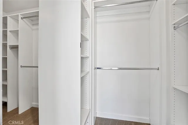 a view of a hallway with closet