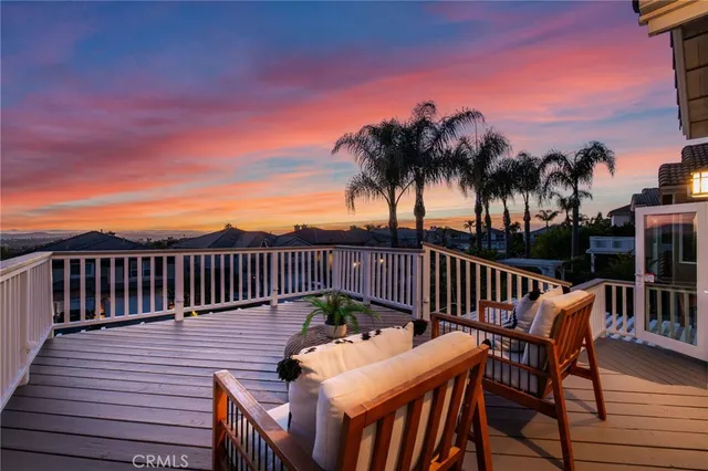 a view of a patio with a table chairs and a patio