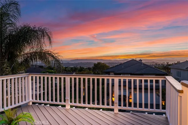 a view of a garden with a house