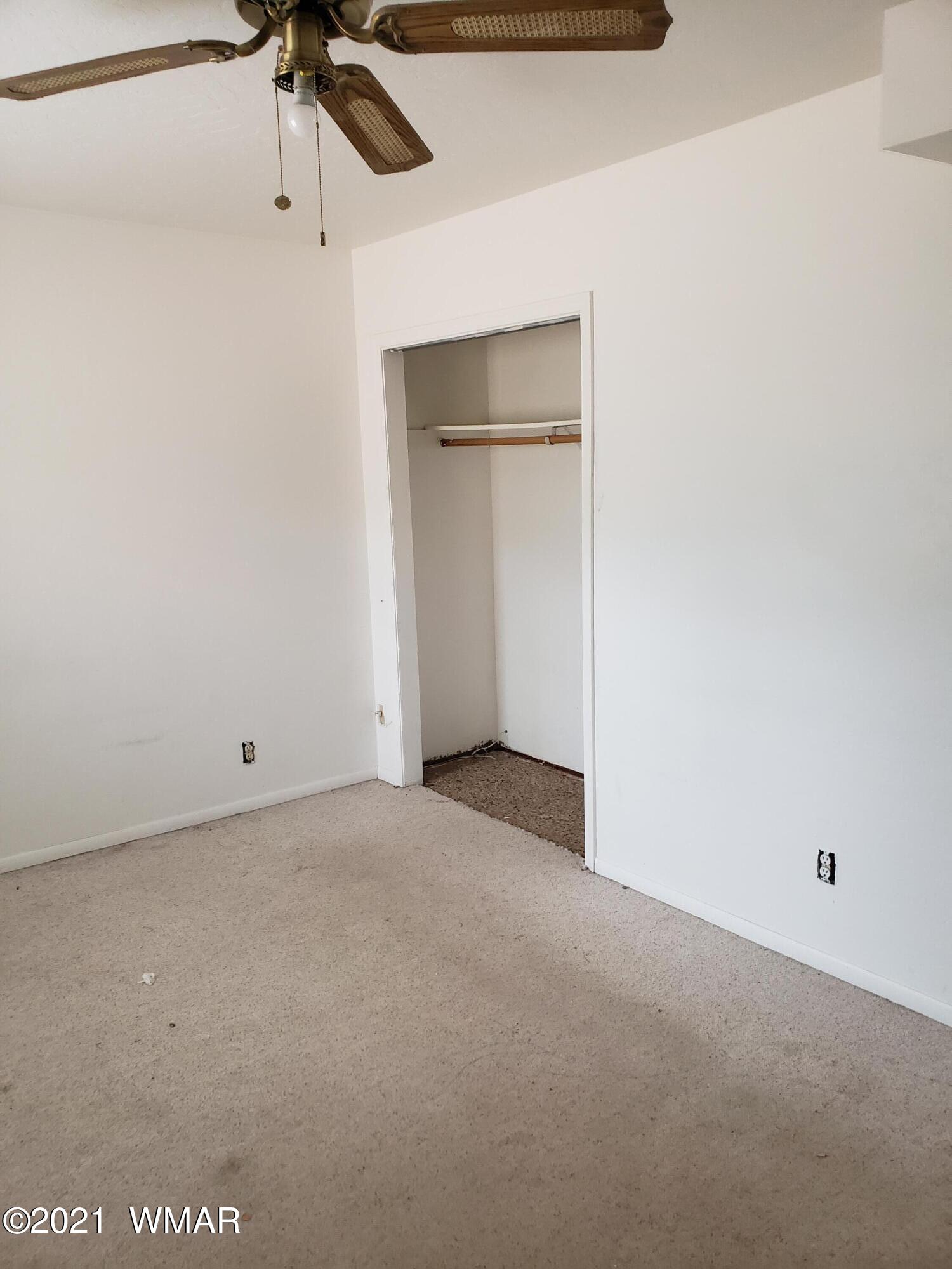 2656 Paper Mill Road Taylor, AZ 85939 - Photo 7 of 14 a view of a room with a ceiling fan