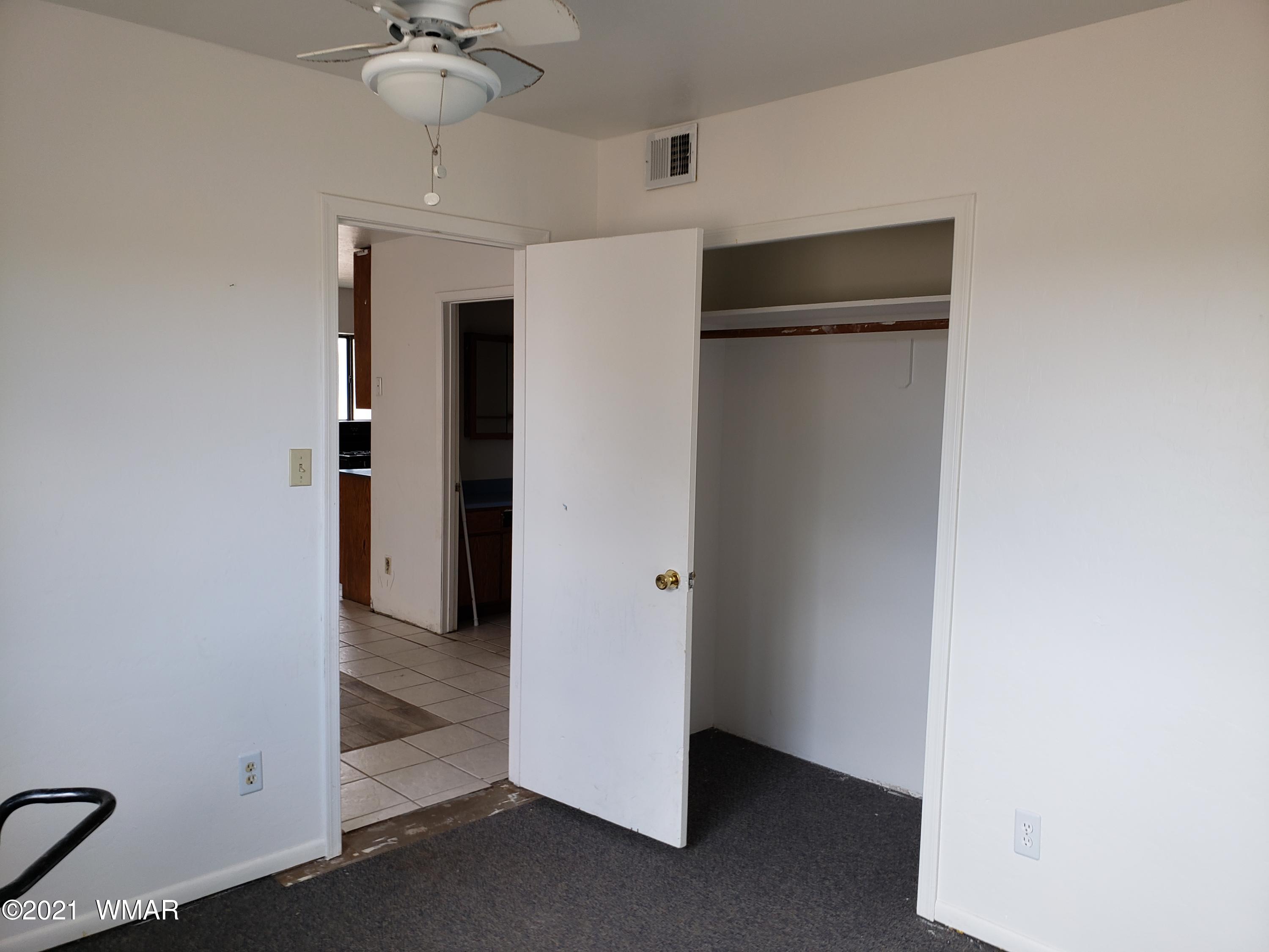 2656 Paper Mill Road Taylor, AZ 85939 - Photo 8 of 14 a view of a hallway with closet